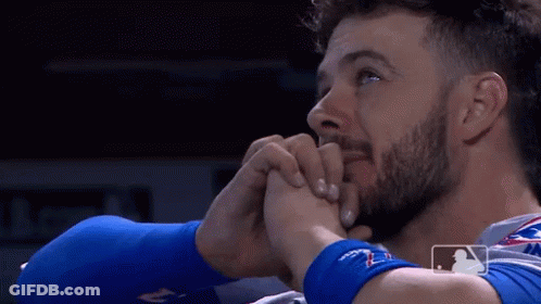 Three Men Sitting At Table With Boxing Gloves GIF