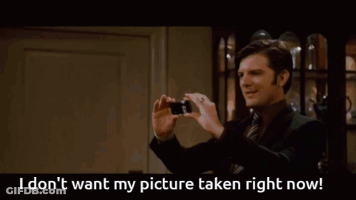 Three Men Sitting At Table With Cake GIF