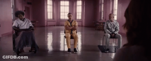 Three Men Sitting In Chairs GIF