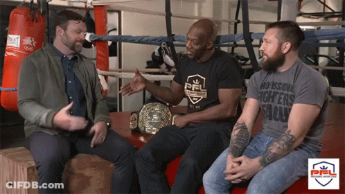Three Men Sitting In Front Of Boxing Ring Professional Fighters League GIF