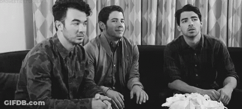 Three Men Sitting On Couch GIF
