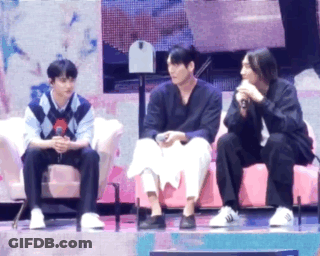 Three Men Sitting On Pink Couch Talking GIF