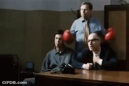 Three Men Sitting With Boxing Gloves GIF