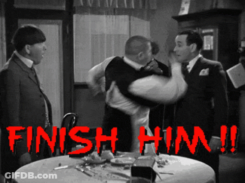 Three Men Standing Around Table Finish Him GIF