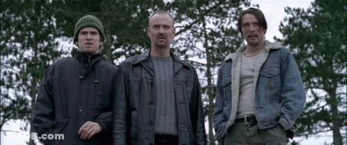 Three Men Standing In A Forest GIF