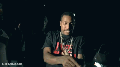 Three Men Standing In Dark Room GIF