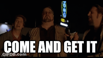 Three Men Standing In Front Of Come And Get It Sign GIF