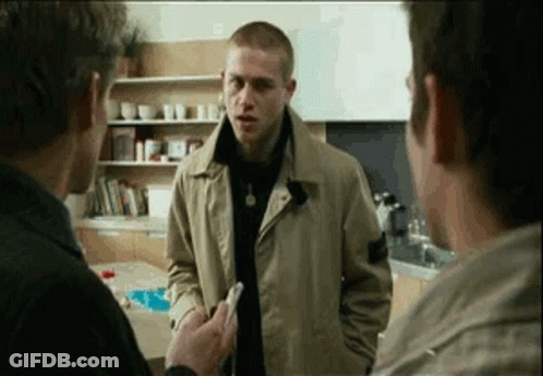 Three Men Standing In Kitchen Talking GIF