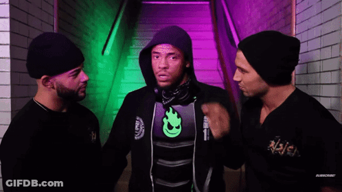 Three Men Standing Next To Each Other One With Hoodie GIF