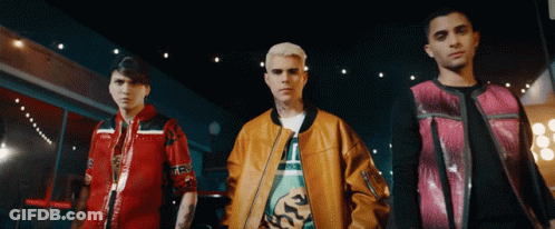 Three Men Standing With One Wearing TRX Jacket GIF