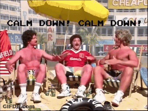 Three Men Under Beach Umbrella Calm Down GIF