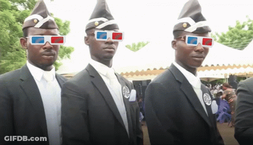 Three Men Wearing Coffin Hats And 3D Glasses Stand In A Line GIF