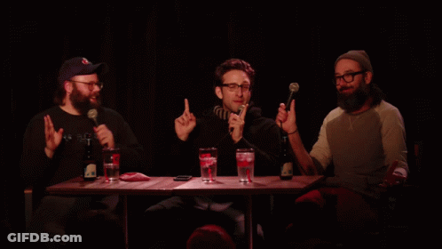 Three Men With Microphones And Yellow Scoop GIF
