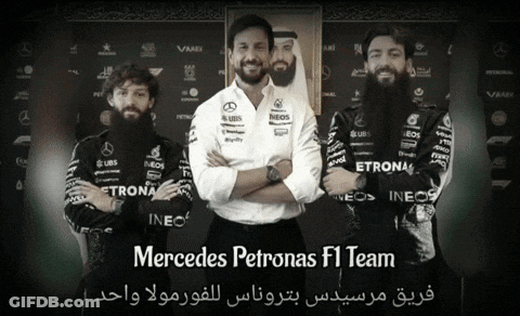 Three Mercedes Petronas F1 Drivers Posing GIF