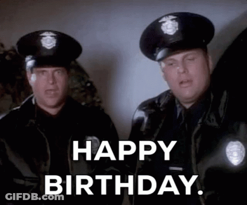 Three Military Men Holding Fireworks By Blue Door GIF