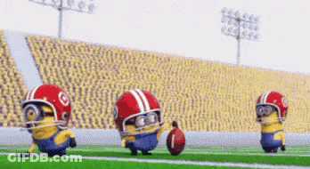 Three Minions Are Playing Football On A Field Wearing Helmets And Holding A Football . GIF