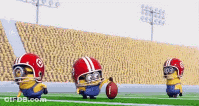 Three Minions Playing Football Wearing Helmets Holding Football GIF