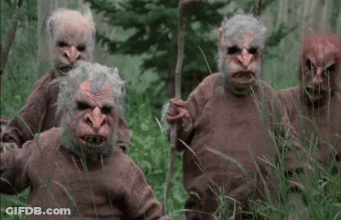 Three Monsters Standing In Grass GIF