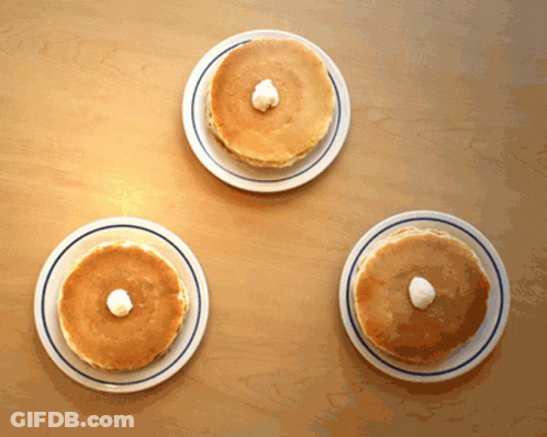 Three Pancake Plates With Whipped Cream GIF