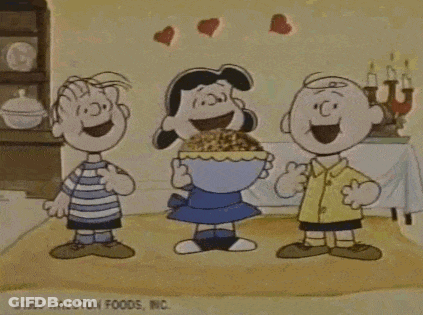 Three Peanuts Characters Standing In Room GIF