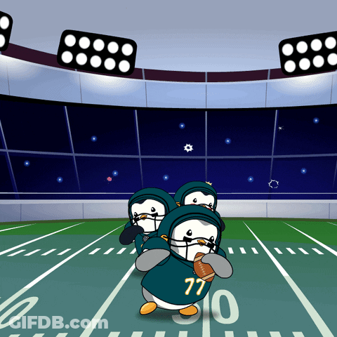 Three Penguins On Football Field With Number 77 GIF
