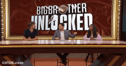 Three People At Table In Front Of Big Brother Unlocked Poster GIF