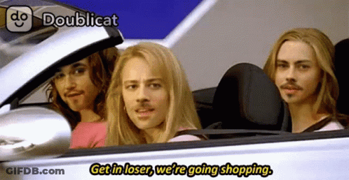 Three People In A Car With Doublicat On Top GIF