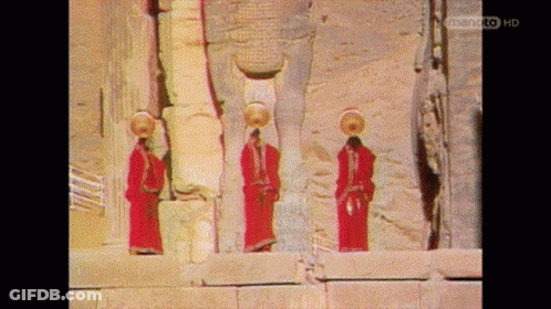 Three People In Red Robes With Asiantoto HD GIF