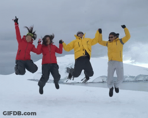 Three People Jumping In The Air With Their Arms In The Air GIF