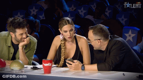 Three People Sitting At Table With Coca Cola GIF