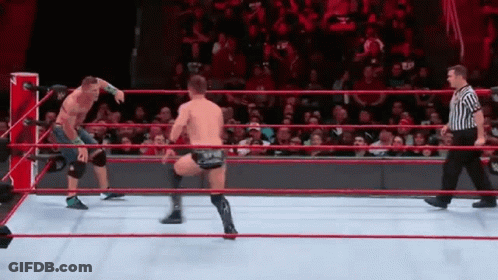 Three People Sitting With Hands On Heads GIF