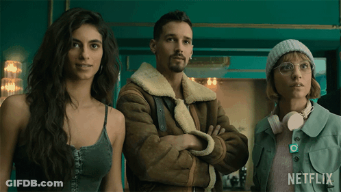 Three People Standing Next To Each Other With A Netflix Logo On The Bottom GIF