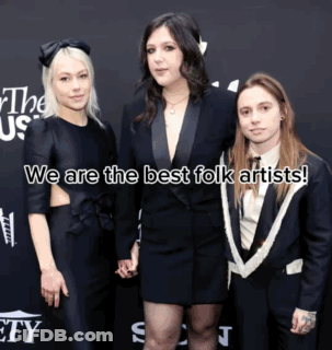 Three People Standing Next To Each Other With The Words We Are The Best Folk Artists On The Bottom GIF