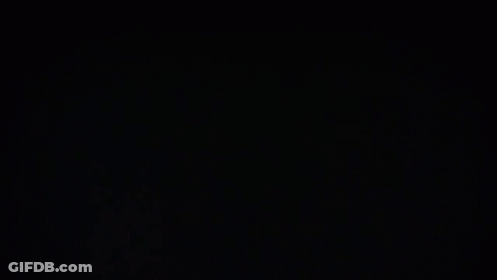 Three Phones Are Being Held In Someone 'S Hands And One Of Them Has A Graphic On The Screen That Says 00000K GIF