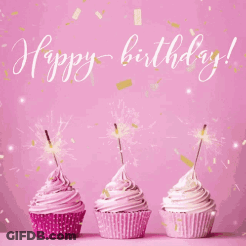 Three Pink Cupcakes With Sparklers Saying Happy Birthday GIF