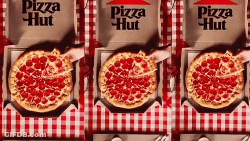 Three Pizza Hut Boxes Are Lined Up On A Checkered Tablecloth GIF