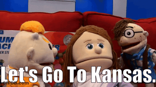 Three Puppet Characters Sitting On Red Couch Saying Let's Go To Kansas GIF