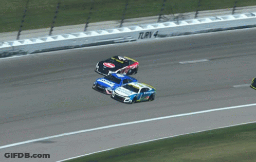 Three Race Cars On Track With TLrv 4 Barrier GIF