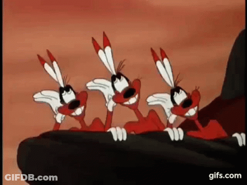 Three Red And White Cartoon Animals Sitting On Rock GIF