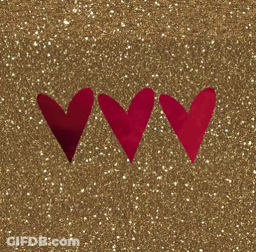 Three Red Hearts Are Lined Up On A Gold Background . GIF