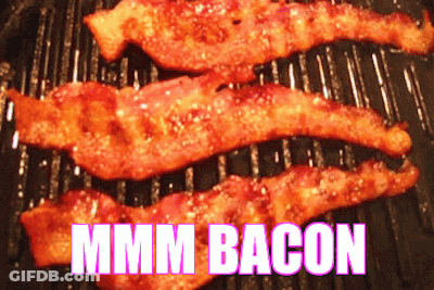 Three Slices Of Bacon Are Cooking On A Grill And The Words Mmmm Bacon Are Visible GIF