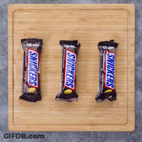 Three Snickers Bars Lined Up GIF