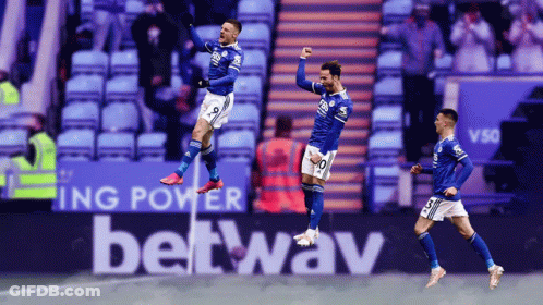 Three Soccer Players Celebrating Goal GIF