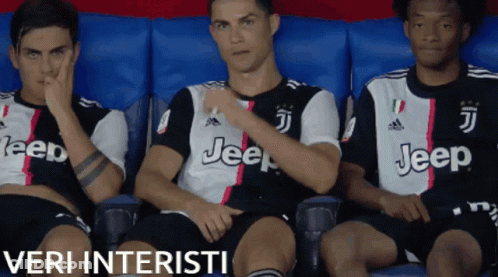 Three Soccer Players In Jeep Jerseys Sitting On Bench GIF