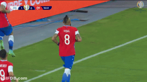 Three Soccer Players In Red And Blue Uniforms Number 8 GIF