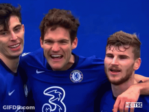 Three Soccer Players Posing GIF