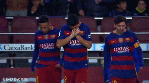 Three Soccer Players Wearing Qatar Airways Jerseys Stand Together GIF