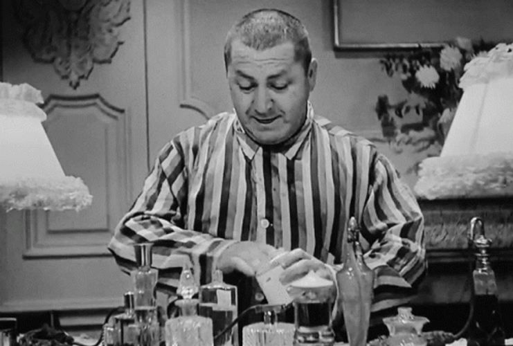 Three Stooges Curly Putting Lotion On Face GIF