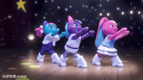 Three Stuffed Animals Are Dancing On A Stage GIF