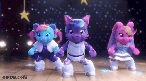 Three Stuffed Animals Are Dancing On A Stage With Stars In The Background GIF